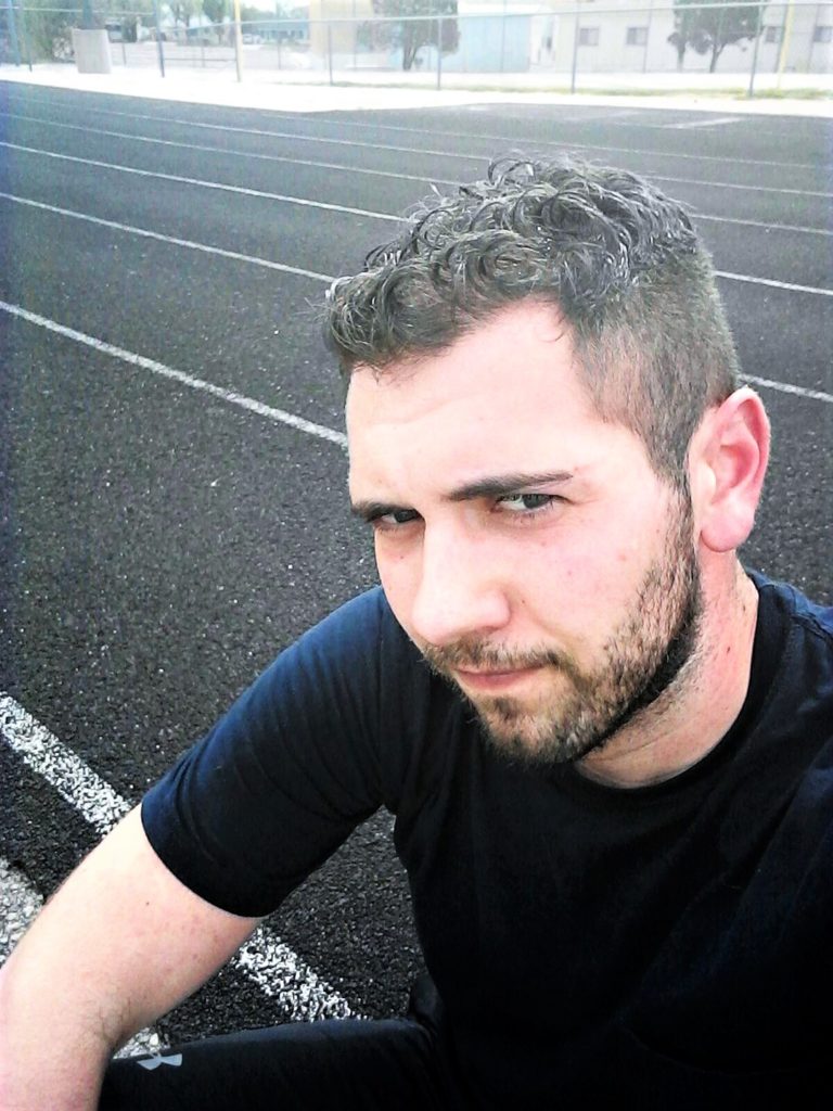 A photo of me at the track, the day I jogged my first non-stop mile