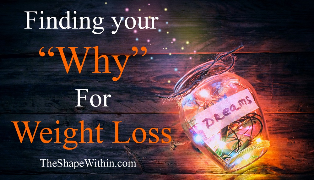 A jar filled with colored lights, that says, "Dreams" on it, resting on a wooden table which says, "Finding your why for weight loss" 